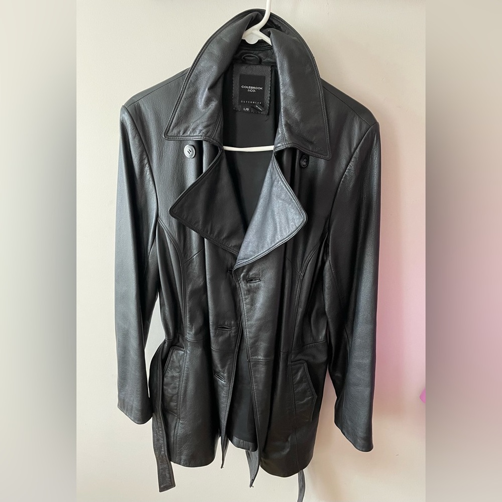 Women’s Black Leather Jacket size large w/ waist belt.  Excellent Condition